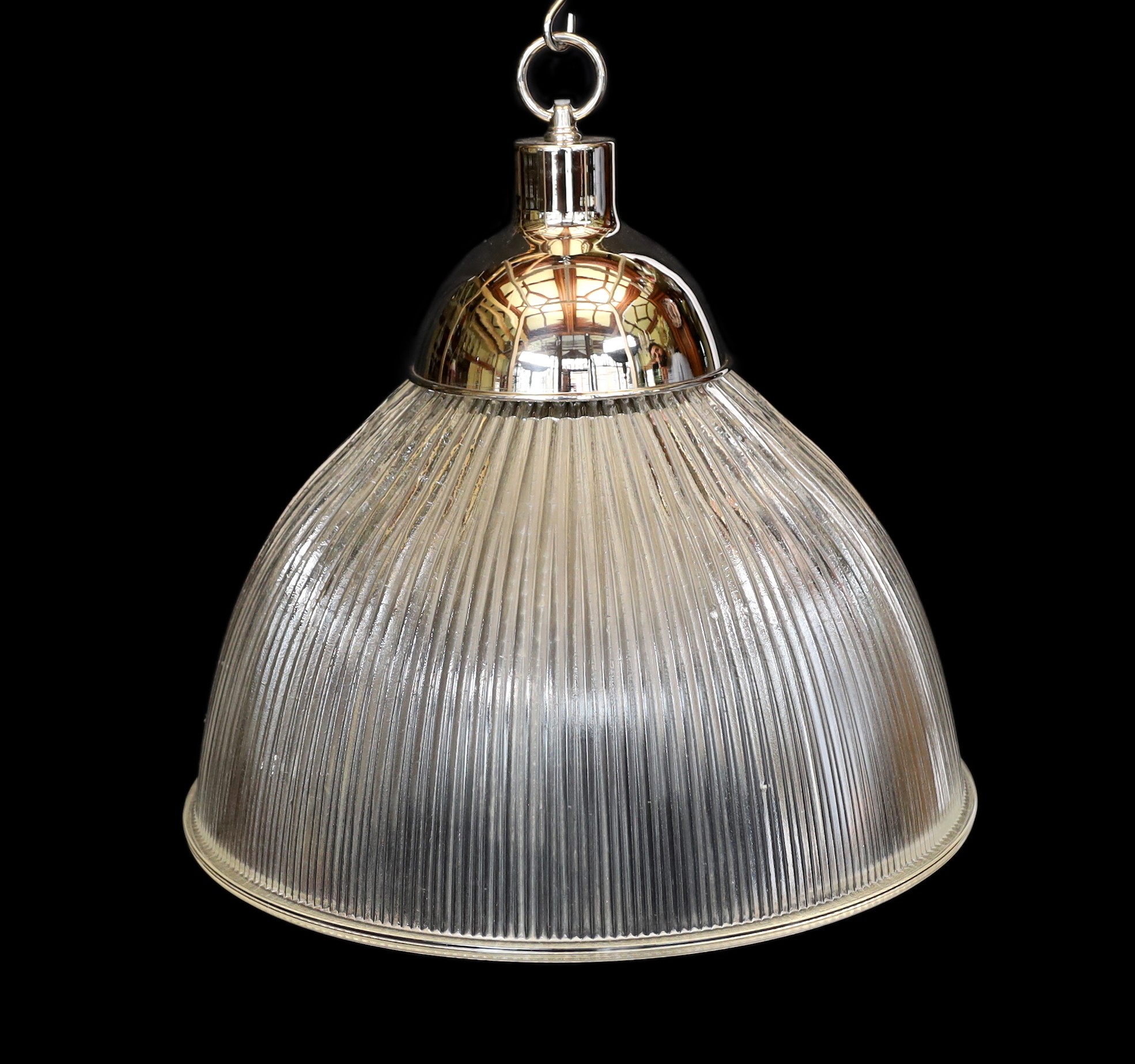 A pair of industrial style chrome plated ceiling lights with ribbed glass shades, signed Endural, diameter 46.5cm. height 50cm